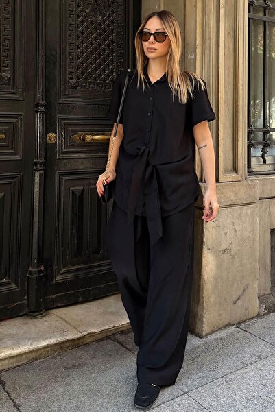 Swist طقم نسائي أسود بأكمام قصيرة وتفاصيل ربط، قميص طويل وبنطلون