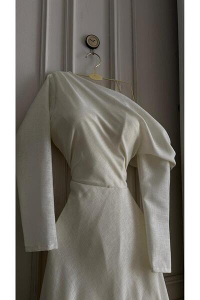 nouf off-white Eid dress