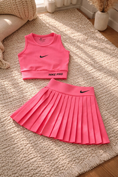 Uğur bebe Neon pink girl's swimsuit set |   Crop top & shorts skirt |   Quick...