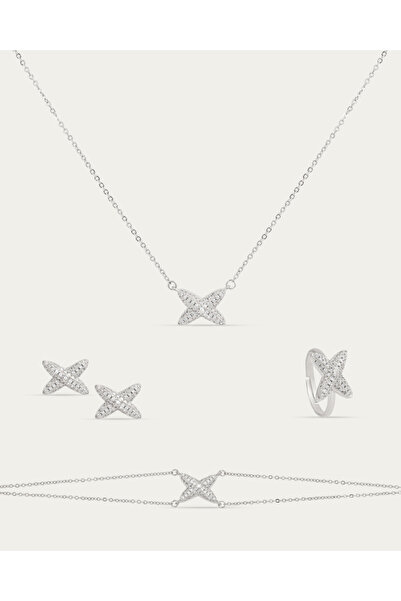 Un Diamond X set inlaid with zircon