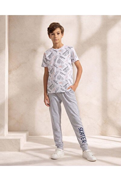 REDTAG طقم بيجاما أبيض مطبوع بالكامل للأولاد الكبار