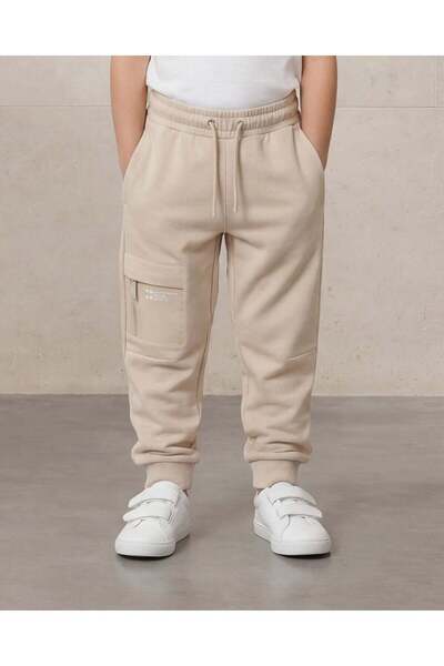 REDTAG بنطال رياضي بيج للأولاد