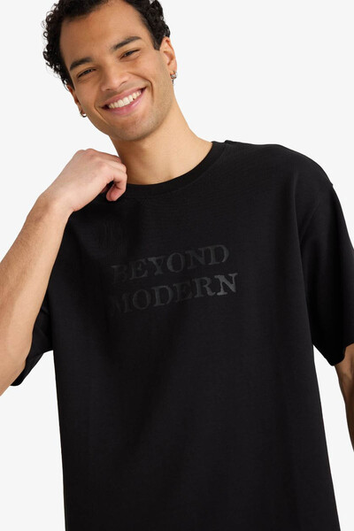 DeFacto Ανδρικό μπλουζάκι με φαρδιά γραμμή και λαιμόκοψη ποδηλάτου με τύπωμα ...