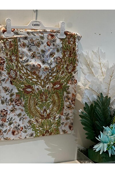 REHAM Emirati-style embroidered fabric for the chest and sleeves