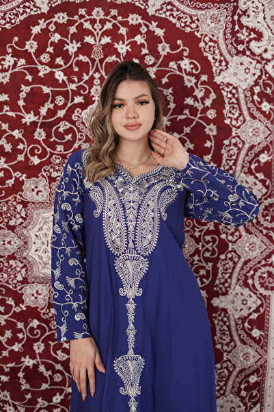 AFandina An elegant jalabiya with embroidered details that reflects a luxurio...
