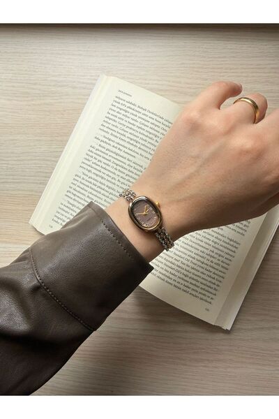 rubsey ساعة يد نسائية كلاسيكية بتصميم معدني بسيط مع حزام داخلي وردي اللون