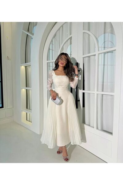 zahraa Lenin and Butcher's shiny evening dress