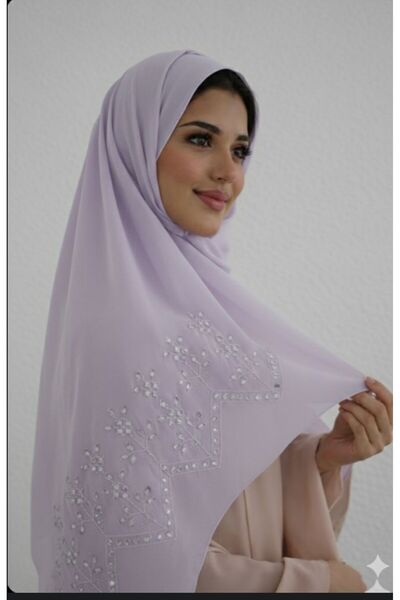 Veil Designer A luxurious veil in mauve hues with unique embroidery. The embr...