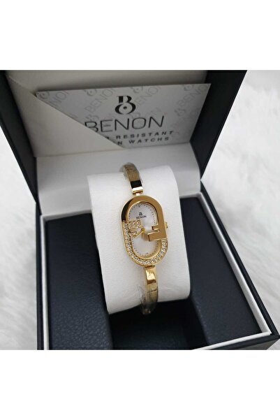 benon The "Benon" watch features an oval gold frame studded with shiny stones...