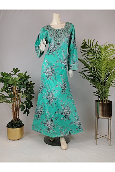 ASIAN Emerald Jalabiya: An elegant jalabiya made of cotton fabric with floral...