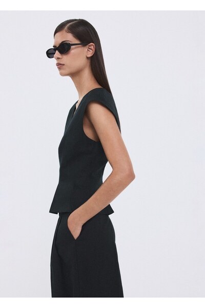 MANGO Woman Koton keten peplum bluz