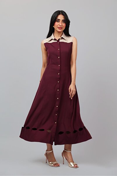 Opera Fashion A soft Crepe dress with elegant laser-cut details.