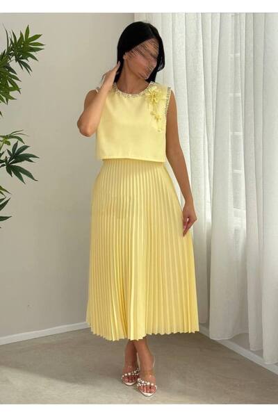 Bamah Lemon-colored midi dress with soft pleats for Eid