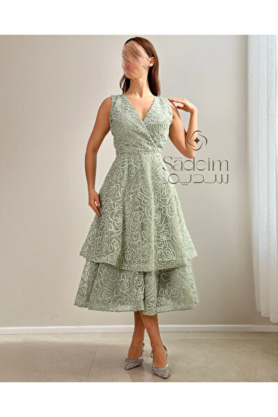 Sadeim Light green embroidered evening dress with a wide cut and elegant femi...