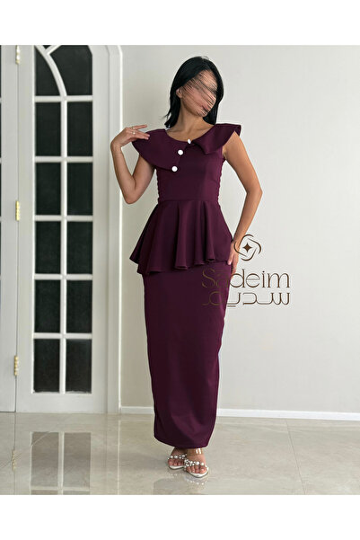 Sadeim A luxurious burgundy dress with a peplum design and elegant buttons.
