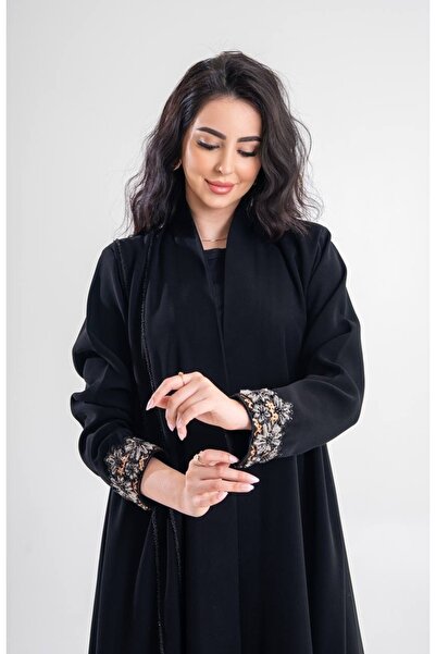 Al Afnan Boutique A distinctive abaya with a blazer cut, made from a unique, ...