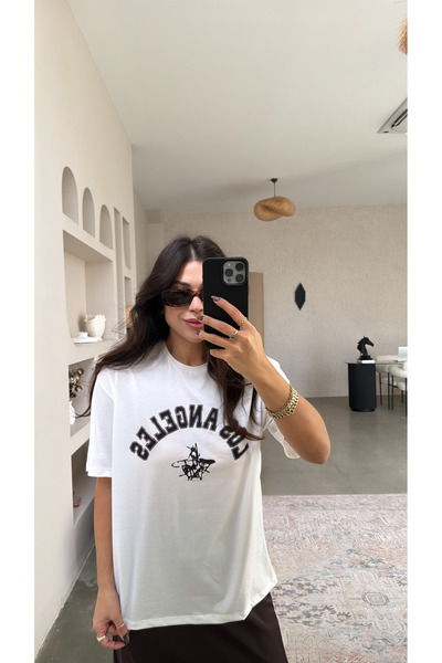 Buket Teke قميص قطني بني مطبوع عليه لوس أنجلوس