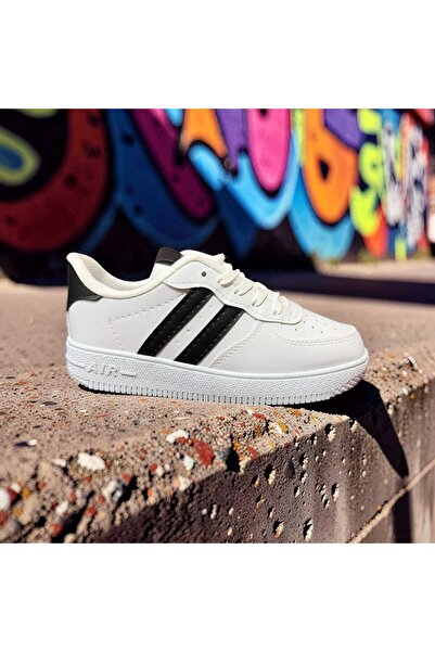 asyagiyimavm25 Şehrin Ritmini Adımlarınla Belirle: İkonik Kontrast Sneaker 🏙️✨