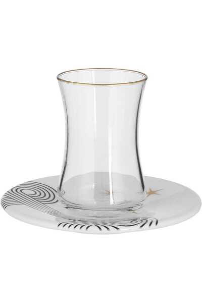 Generic Al Saif Gallery glass teapot with porcelain saucer, two pieces, sun p...