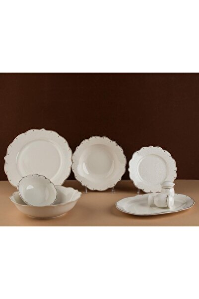 TOHFAT-AL MAIDAH A luxurious dinnerware set consisting of 28 pieces of fine p...