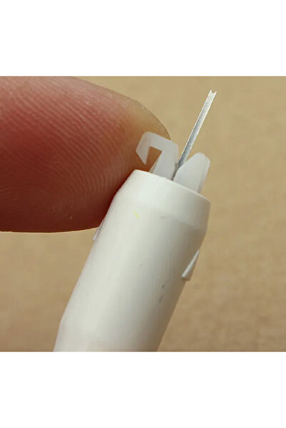 TASAYMAKİNE iğneye iplik geçirme aparatı