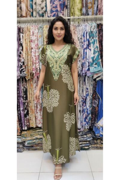 Generic An attractive olive-colored jalabiya with tree patterns and gold embr...