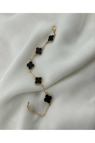 burjalmodah Gold bracelet with a black clover design