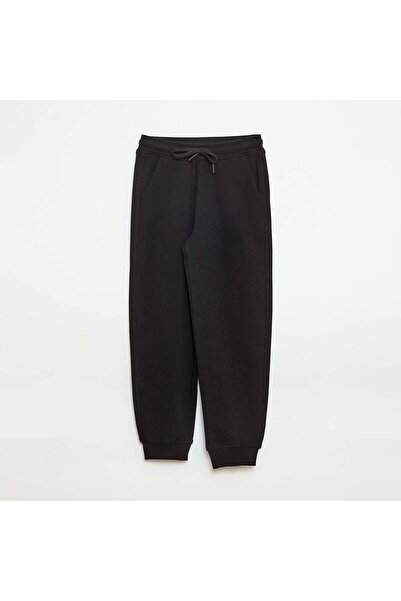 KIABI بنطال رياضي أسود سادة من صوف الفليس خفيف