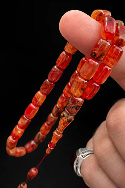 Cemhan Göksal سبحة من حجر العنبر الناري، قطع كبسولي، مقاس 7×10 ملم