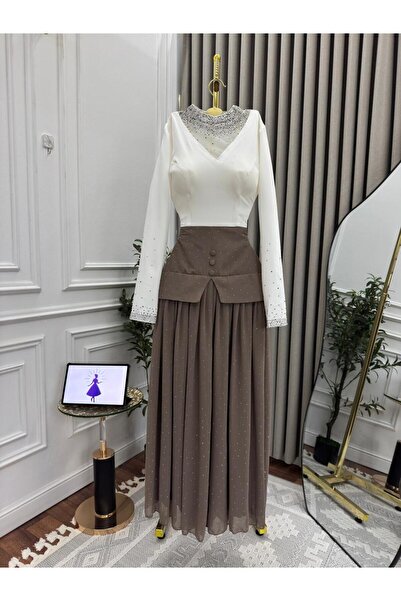 shumus A very elegant and sophisticated evening dress made of chiffon with pr...