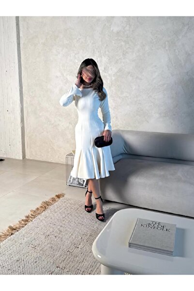 REVE فستان أبيض ميدي، بأكمام طويلة وخصر محدد، تنتهي تنورته بكسرات.