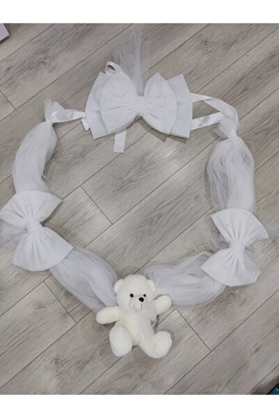 Handmade White baptismal font decoration with teddy bear