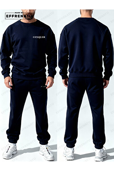 EFFRENATU The Hoodless, Navy Blue Tracksuit Is Designed with Original Prints.