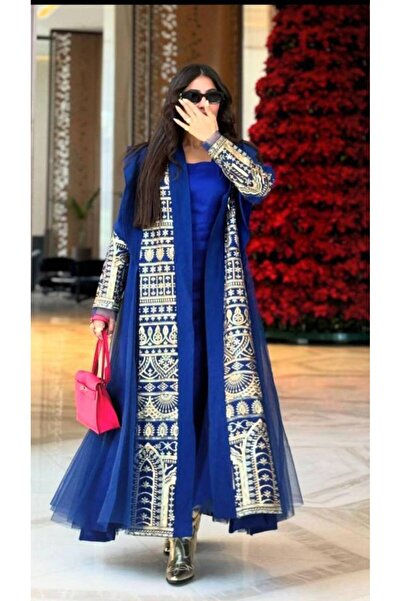 ranin Barbie-style jalabiya with computer embroidery