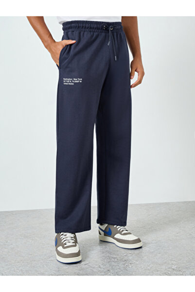 Styli Men Navy Blue Minimal Slogan Oversized Joggers