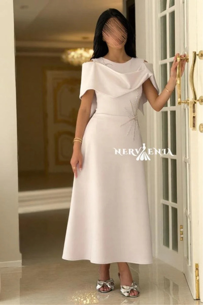 narvenia Starlight midi dress with draping and side embroidery