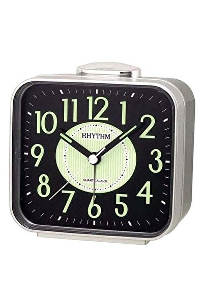 Generic ساعة منبه تناظرية كوارتزية مضيئة في الظلام، فضية وسوداء، بإيقاع متوهج...