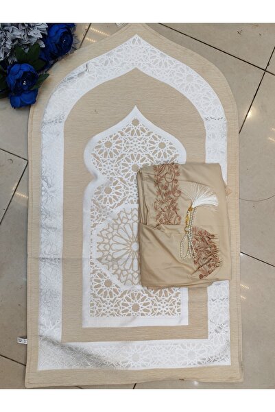 RUG A soft beige prayer set including a white patterned rug and a prayer shee...