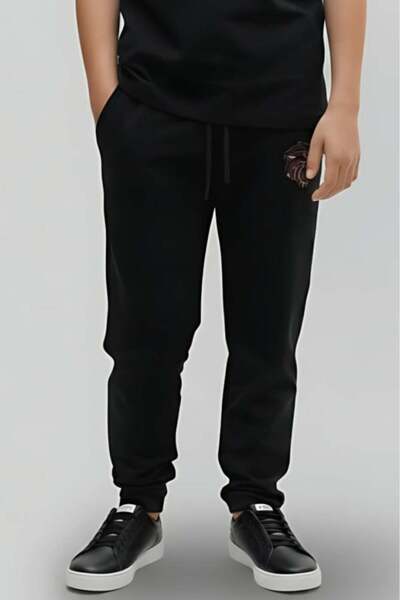 Alesaei-mondo tondo (Boys' black track pants with a comfortable and modern de...