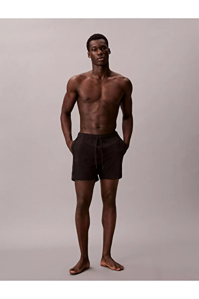 Calvin Klein Men's Regular Fit Black Swim Shorts with Logo Stripes on the Sid...