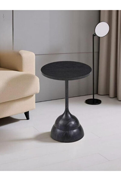 BEC30 A round serving table with a unique, streamlined design