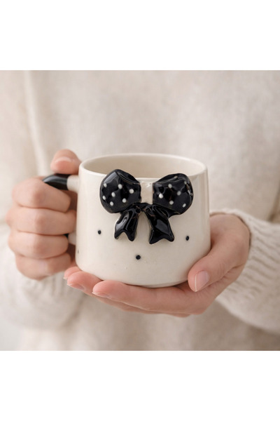 Mug with black bow detail
