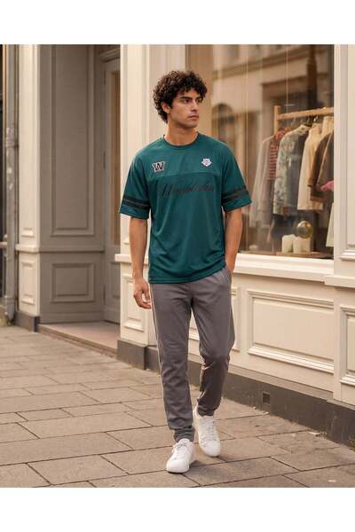 REDTAG تيشيرت رياضي رجالي واسع باللون الأزرق المخضر