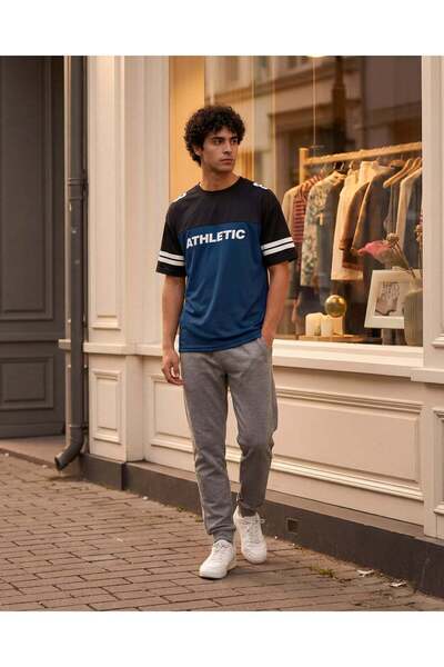 REDTAG تيشيرت رياضي رجالي أزرق فضفاض