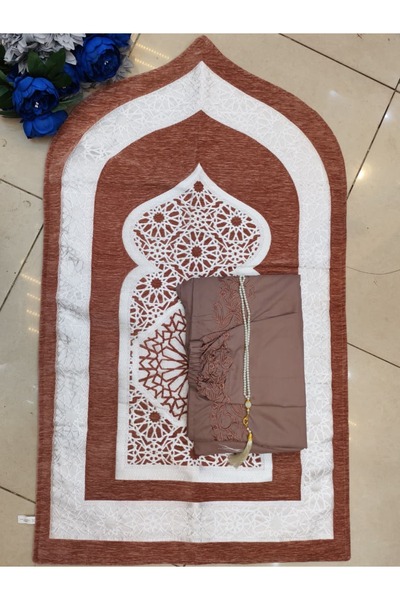 RUG A prayer set in a warm coffee color, containing a white patterned rug and...