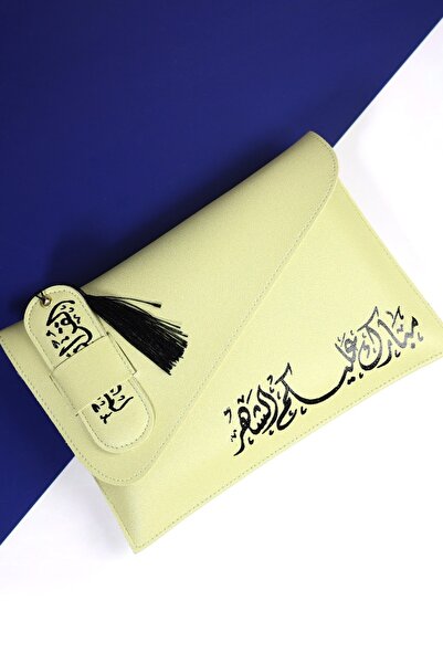 casing A bright lemon-colored organizer Bag with a touch of black Arabic call...