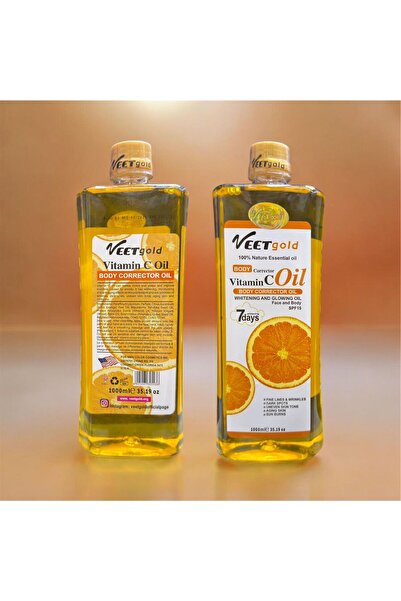 Veet Gold زيت فيتامين سي لتصحيح الجسم، 1000 مل - زيت مبيض ومشرق للوجه والجسم
