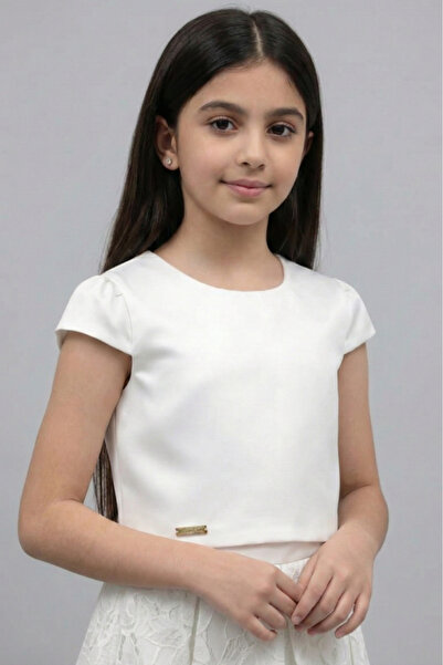 Alesaei-mondo tondo (Elegant white girls' blouse decorated with a large flowe...