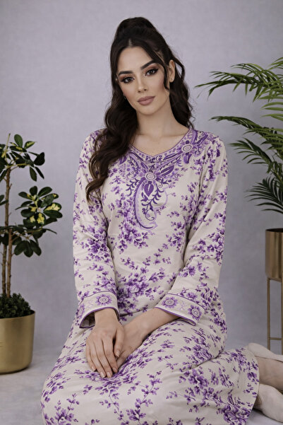 ASIAN Emerald Jalabiya: An elegant jalabiya made of cotton fabric with floral...