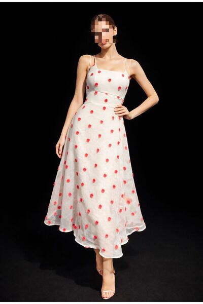 tasmim kian White midi dress with thin straps, decorated with red pom-poms